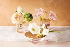 Flowers in cup vases