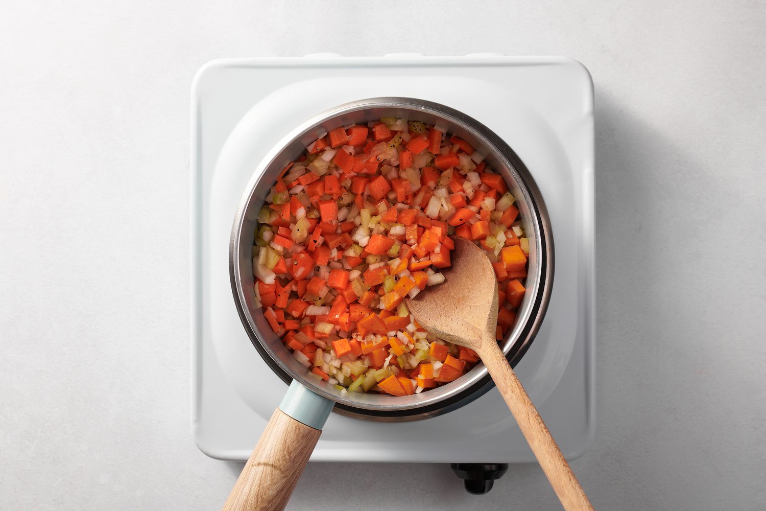 15-minute lentil soup - mixing carrots and onions