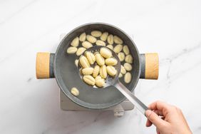 Gnocchi with Tomato Sauce - remove gnocchi from water