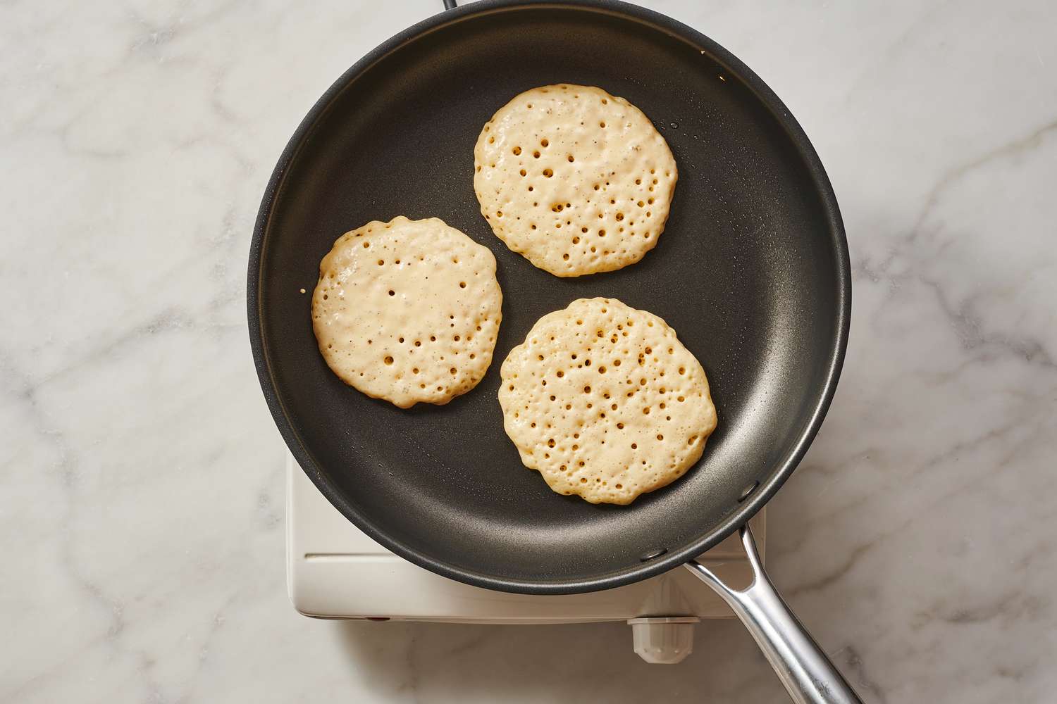 pancakes ready to flip for easy basic pancakes recipe