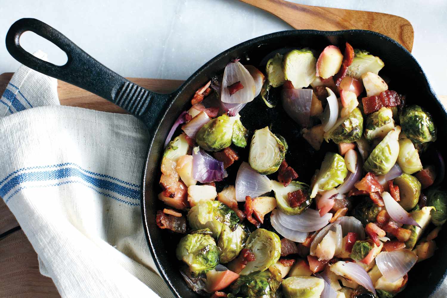 brussel sprouts, bacon, onion in skillet