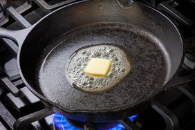 Skillet with butter melting in it.