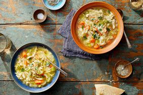 two bowls of chicken soup with rice