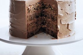 chocolate cake on white cake stand