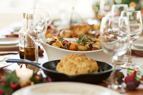 holiday table set with food and table settings