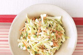 cream coleslaw in white bowl