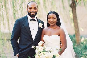 bride and groom outside on walkway