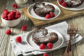 Heart shaped brownies with raspberries