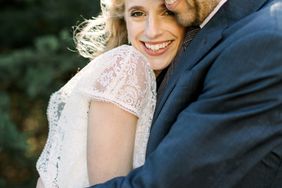 gillian marcus wedding couple smile embrace