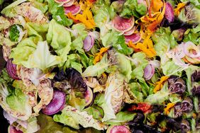 close up of green salad with pickled-shallot vinaigrette