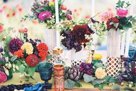 cluster centerpiece with red yellow and burgundy flowers