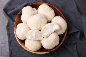 lions mane mushrooms in wood bowl