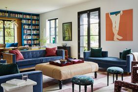 modern living room with stools and tufted furniture