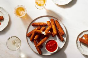 homemade mozzarella sticks on round platter