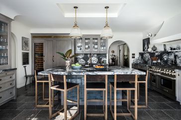 kitchen with marble and tile island in contrasting colors