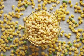 frozen corn kernels in a glass bowl