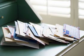 Pile of mail on a desk