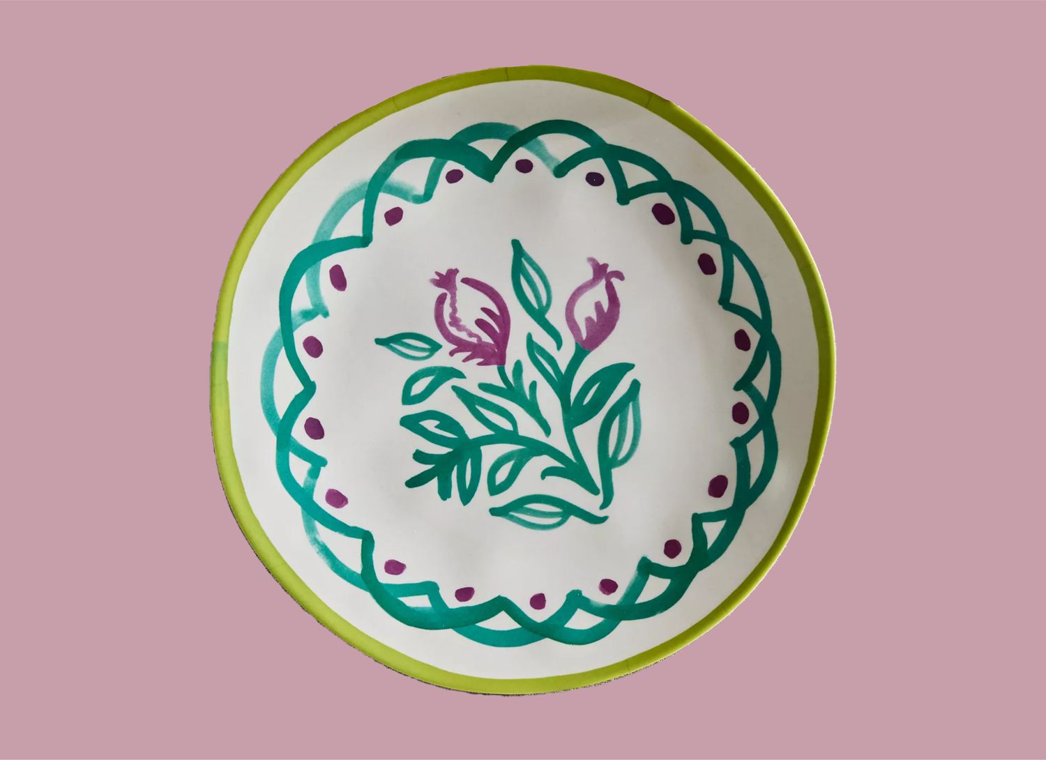 colorful melamine dinner plate on a pink background