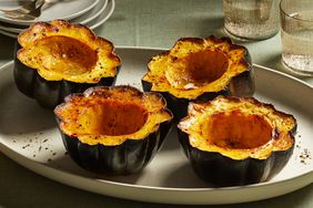 cooked acorn squash on a platter