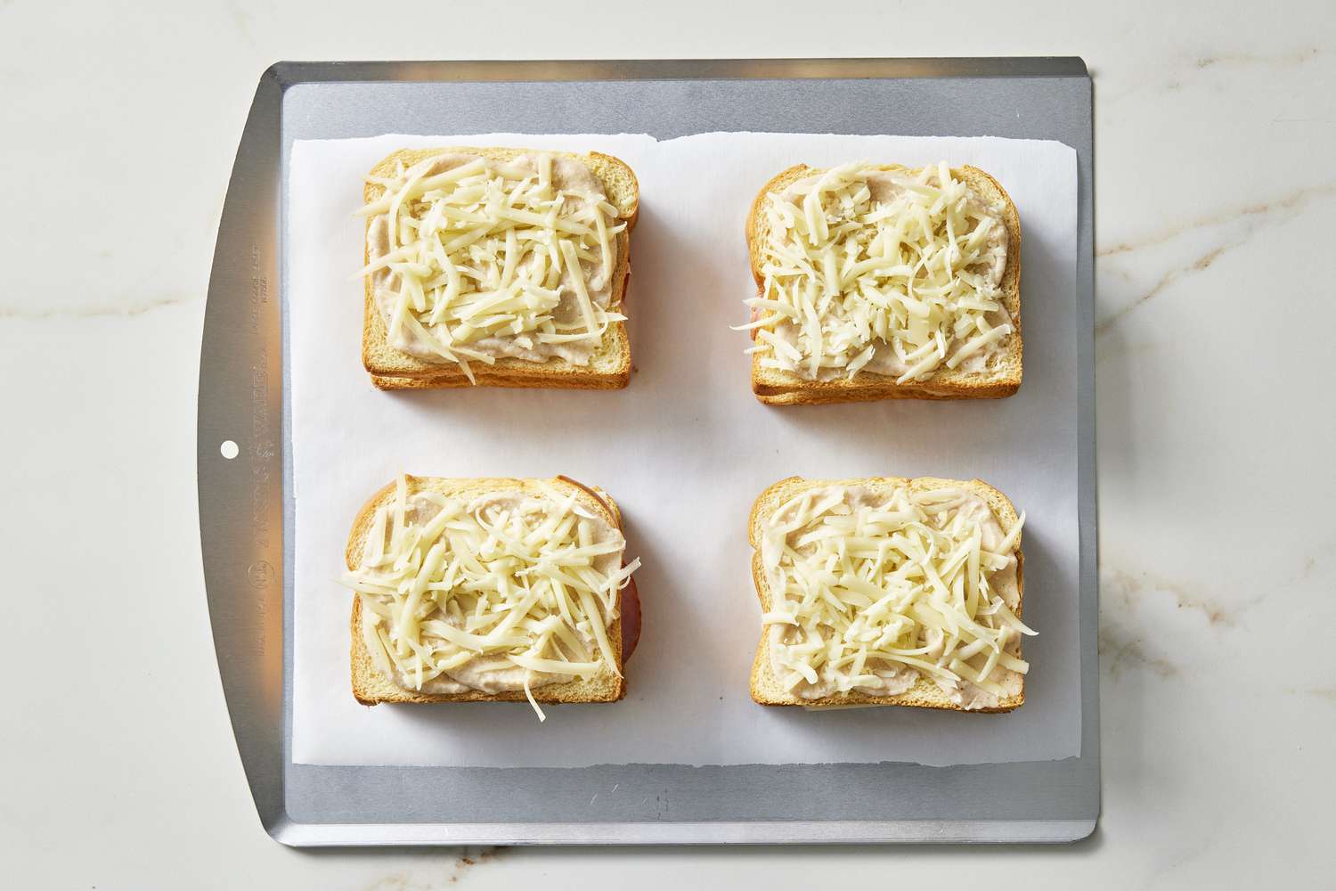 croque monsieur on baking sheet