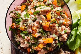 no-mayo mediterranean tuna salad served with salad greens