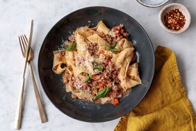 hand-cranked pasta served on a gray plate