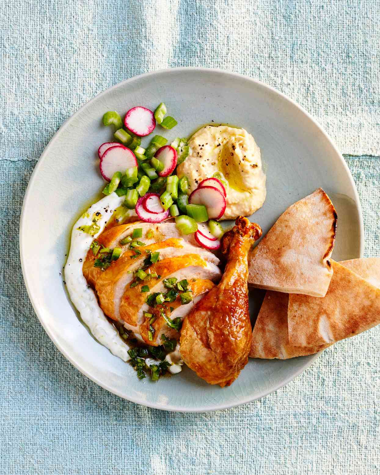 rotisserie chicken with yogurt sauce and herb relish