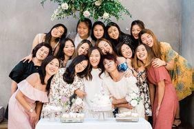 sally bridal shower group photo in front of desserts