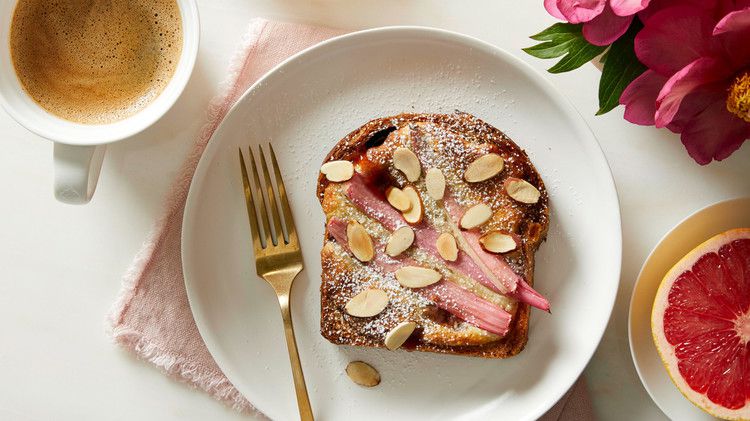 strawberry-rhubarb bostock topped with sliced almonds