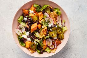 sweet potato taco salad served in pink bowl