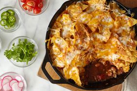 taco casserole with toppings on the side