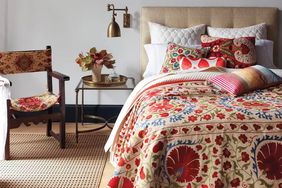 Bedroom with various textiles