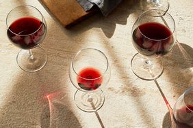 red wines in glasses on table