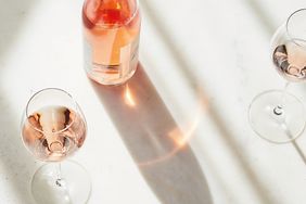 rose wine bottle and glass on table