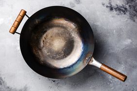 Wok pan with wooden handle